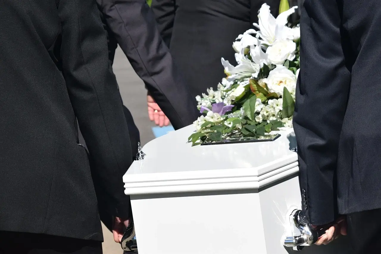 Coffin with Flowers for Funeral Services